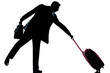silhouette man with his suitcase pulling him