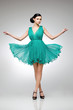 brunette in teal dress