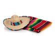 Photo: Serape and sombrero on a white background Serape and sombrero on a white background
