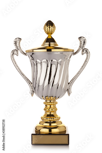 Photo: Gold trophy cup on white background Gold trophy cup on white background