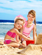Child playing on  beach.