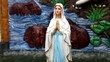 A praying virgin mary statue in worship