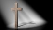 The christian cross on volumetric light