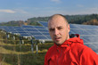 Male solar panel engineer at work place Male solar panel engineer at work place