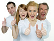Happy group of young and old people showing thumbs up