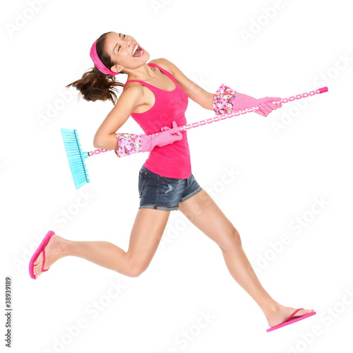 Foto: Cleaning woman happy jumping Cleaning woman happy jumping