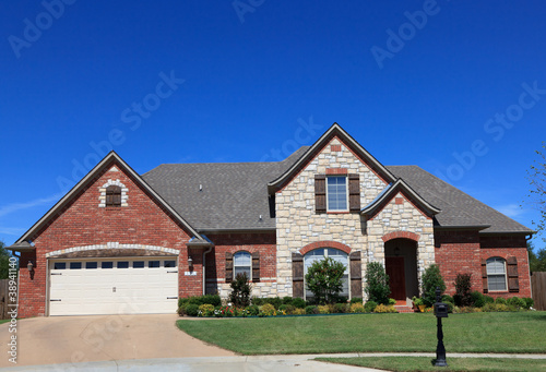 Photo: Beautiful home in front of blue sky Beautiful home in front of blue sky