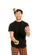 Young man juggling isolated on white background