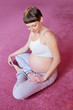 Photo: Young pregnant woman doing pregnancy yoga Young pregnant woman doing pregnancy yoga