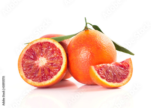 Photo: Blood red oranges isolated on white background Blood red oranges isolated on white background