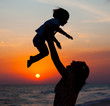Mother and little son silhouettes