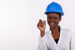 Copyspace image of woman with hard-hat making a drawing..