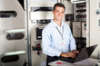 Photo: portrait of professional industrial technician at work portrait of professional industrial technician at work