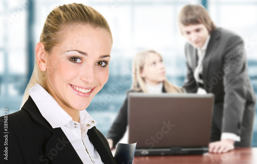 Photo: Business woman in an office environment Business woman in an office environment