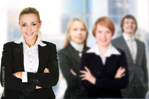 Photo: Business woman in an office environment Business woman in an office environment