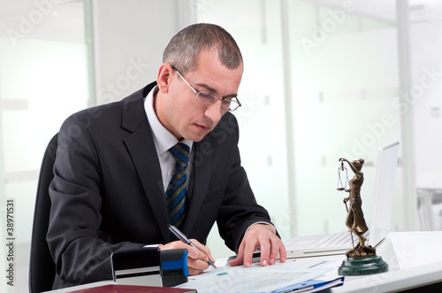 Foto: Lawyer on his workplace Lawyer on his workplace