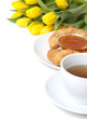 Continental breakfast and flowers, empty space for your text