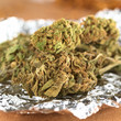 Photo: Dried flowers of Cannabis sativa on tinfoil Dried flowers of Cannabis sativa on tinfoil