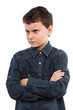 Angry boy with arms folded