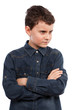 Angry boy with arms folded