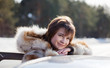 Happy woman with her car