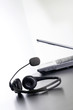 Modern computer and headphones in a row. Modern computer and headphones in a row.