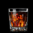 Foto: cola with cognac in glass on black cola with cognac in glass on black