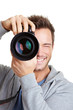 Mann fotografiert mit Kamera
