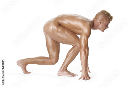 Photo: Hombre desnudo en partida de carrera. Hombre desnudo en partida de carrera.