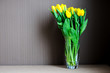 Photo: A bouquet of yellow tulips in a glass vase A bouquet of yellow tulips in a glass vase