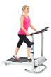 Photo: young woman doing exercises on treadmill young woman doing exercises on treadmill