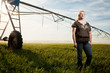 Photo: Woman standing in a field Woman standing in a field