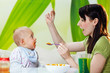 mother feeding baby