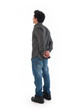 Foto: Young man posing backwards against white background. Young man posing backwards against white background.
