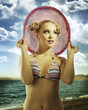 blond girl wearing pink summer hat