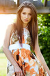 Portrait of the young beautiful smiling woman outdoors