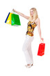 junge blonde Frau mit Einkaufstaschen