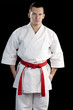 ontrast karate young fighter on black