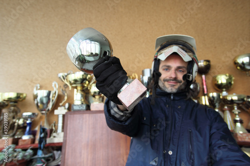 Photo: motorcyclist with trophy motorcyclist with trophy