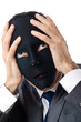 Industrial espionage concept with masked businessman