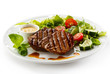 Grilled steaks and vegetables