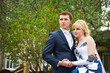 Bride and groom on floral background