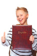 schoolboy proud of his school certificate