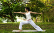 Photo: yoga woman on green grass yoga woman on green grass