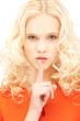 finger on lips