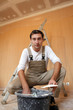 Man mixing plaster