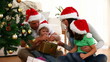 Montage of Christmas videos which a hand is scrolling through