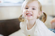 Adorable little girl laughing indoors Adorable little girl laughing indoors