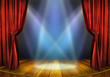 Theater stage with red curtains and spotlights