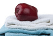 Apple on two towels isolated on white background